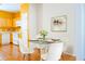 Eat-in kitchen area featuring a modern glass table with seating for four at 5352 Beaver Br, Norcross, GA 30071