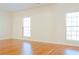 Bright living room showcasing hardwood floors and abundant natural light at 5352 Beaver Br, Norcross, GA 30071