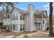 Charming two-story condo building with balconies, complemented by mature trees and landscaping at 1510 Gettysburg Pl, Atlanta, GA 30350