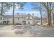 Well-maintained condo building with balconies and convenient parking in a tree-lined setting at 1510 Gettysburg Pl, Atlanta, GA 30350