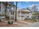 Charming two-story condo building with balconies, complemented by mature trees and landscaping at 1510 Gettysburg Pl, Atlanta, GA 30350