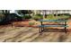 Outdoor picnic area featuring a park grill and picnic table surrounded by mature landscaping at 1510 Gettysburg Pl, Atlanta, GA 30350