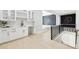 Stylish bar area with white cabinets, countertop, and wine rack offers an elegant space for entertaining at 3057 Bold Springs Rd, Dacula, GA 30019