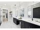 Bright bathroom featuring double sinks, modern fixtures, and elegant design at 3057 Bold Springs Rd, Dacula, GA 30019