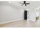 Bright bedroom with hardwood floors, and access to the ensuite bathroom at 3057 Bold Springs Rd, Dacula, GA 30019