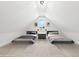 Bonus room featuring two twin beds and hardwood floors at 3057 Bold Springs Rd, Dacula, GA 30019