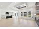 Open-concept great room connecting kitchen and living with lots of windows and light at 3057 Bold Springs Rd, Dacula, GA 30019
