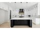 Stylish kitchen with a large center island, elegant pendant lighting, and plenty of counter space at 3057 Bold Springs Rd, Dacula, GA 30019