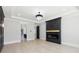 Modern living room with hardwood floors and a cozy fireplace at 3057 Bold Springs Rd, Dacula, GA 30019