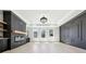 The living room features fireplace, custom shelves, decorative trim, and natural light from large windows at 3057 Bold Springs Rd, Dacula, GA 30019