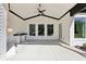 Inviting outdoor living space featuring a ceiling fan and a convenient outdoor sink at 3057 Bold Springs Rd, Dacula, GA 30019