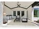 Inviting outdoor living space featuring a ceiling fan and a convenient outdoor sink at 3057 Bold Springs Rd, Dacula, GA 30019