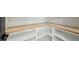 Walk-in pantry featuring wooden shelves and ample storage space for all your culinary needs at 3057 Bold Springs Rd, Dacula, GA 30019