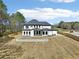 Modern home with a spacious backyard, perfect for entertaining and relaxation at 3057 Bold Springs Rd, Dacula, GA 30019
