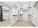Spacious walk-in closet with custom shelving at 3057 Bold Springs Rd, Dacula, GA 30019