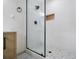 Bathroom featuring glass shower with white tile at 546 Milligan Dr, Stone Mountain, GA 30083