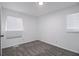 Bright bedroom with carpet, white walls and a minimalist design, ideal for relaxation at 7437 Nulan Way, Riverdale, GA 30274
