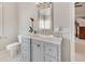 Chic bathroom with gray vanity, marble countertop, and modern fixtures at 764 Sharpshooters Nw Rdg, Marietta, GA 30064