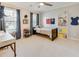 Comfortable bedroom with a ceiling fan, and a desk by a window for lots of natural light at 764 Sharpshooters Nw Rdg, Marietta, GA 30064