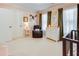 Bedroom with recliner, crib, dresser, shelving, and multiple windows at 764 Sharpshooters Nw Rdg, Marietta, GA 30064