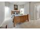 Finished basement bedroom featuring full sized bed, carpet flooring, and access to storage at 764 Sharpshooters Nw Rdg, Marietta, GA 30064