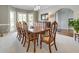 Formal dining room showcasing crown molding, large windows, and a traditional wood table set perfect for entertaining at 764 Sharpshooters Nw Rdg, Marietta, GA 30064