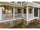 Beautiful covered front porch with classic white columns, offering a welcoming entry to the home at 764 Sharpshooters Nw Rdg, Marietta, GA 30064