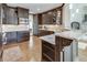 Gourmet kitchen with granite counters, custom cabinetry, and stainless steel appliances at 764 Sharpshooters Nw Rdg, Marietta, GA 30064