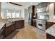 Modern kitchen with a Wolf range, custom cabinets, granite countertops and stainless sink at 764 Sharpshooters Nw Rdg, Marietta, GA 30064