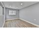 Bright bedroom with wood-look flooring and a window, offering plenty of natural light at 2773 Marcia Dr, Lawrenceville, GA 30044