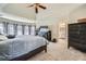 This spacious main bedroom includes an en-suite bathroom and generous closet space for convenience and comfort at 5106 Vinings Estates Se Way, Mableton, GA 30126