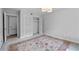 Serene bedroom with neutral walls, a spacious closet, and soft lighting, creating a restful and inviting atmosphere at 80 Montre Nw Sq, Atlanta, GA 30327
