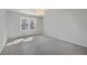 Bright bedroom with carpet and a double window, offering natural light and a neutral palette to personalize at 80 Montre Nw Sq, Atlanta, GA 30327