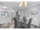 Charming dining room with gray walls, white trim, and wood flooring, offering a seamless transition to the living spaces at 80 Montre Nw Sq, Atlanta, GA 30327