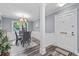 Inviting dining room boasts elegant gray walls, classic wainscoting, and wood floors, perfect for gatherings and everyday meals at 80 Montre Nw Sq, Atlanta, GA 30327