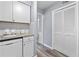 Practical kitchen area with white cabinets, granite countertops, and a dishwasher, providing convenience and style at 80 Montre Nw Sq, Atlanta, GA 30327