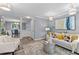 Modern living room with a view into the dining room at 80 Montre Nw Sq, Atlanta, GA 30327