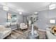 Bright living room featuring modern lighting, gray walls, and stylish decor at 80 Montre Nw Sq, Atlanta, GA 30327