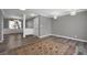 Open living area with new hardwood floors, neutral paint, updated lighting, and an open concept design at 80 Montre Nw Sq, Atlanta, GA 30327