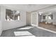 Bright sunroom with a door leading to living spaces, offering seamless transition and natural light at 80 Montre Nw Sq, Atlanta, GA 30327