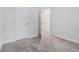 Spacious bedroom with carpet and access to an adjacent room at 139 Jameson E Dr, Acworth, GA 30102