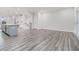 Spacious living area with hardwood floors, stairs, and seamless access to the kitchen and dining areas at 139 Jameson E Dr, Acworth, GA 30102