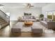 Bright living room featuring neutral decor, stylish furniture, and a cozy rug at 3671 Salvia Dr, Buford, GA 30519