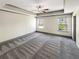 Spacious main bedroom featuring carpet floors and a neutral color scheme at 3671 Salvia Dr, Buford, GA 30519
