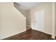 Entryway with dark wood-look flooring and a staircase at 117 Oliver Dr, Locust Grove, GA 30248