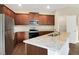 Well-equipped kitchen with stainless steel appliances and granite countertops at 117 Oliver Dr, Locust Grove, GA 30248