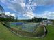 Aerial view of the community outdoor sports facilities with tennis and basketball courts at 117 Oliver Dr, Locust Grove, GA 30248