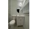 Bathroom featuring an updated vanity with a modern sink and stylish mirror at 4222 Castle Pines Ct, Tucker, GA 30084