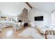 Bright living room with a cozy seating area and a modern fireplace at 1110 Vernon Springs Ct, Atlanta, GA 30327