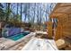 Outdoor hot tub with seating, wooded views and a cozy, private setting at 1110 Vernon Springs Ct, Atlanta, GA 30327